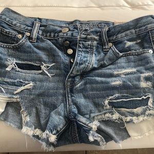 Distressed denim shorts